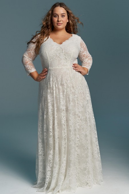 Elegancka, zabudowana suknia ślubna plus size z długim rękawem